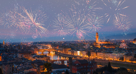 Ponte Vecchio over Arno river with fireworks at twilight blue hour - Florence, Italy - obrazy, fototapety, plakaty