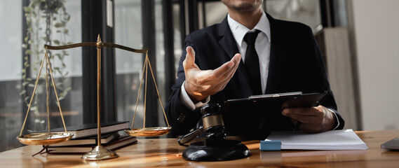 lawyer working with contract agreement at table office, law and justice concept, Selective focus.