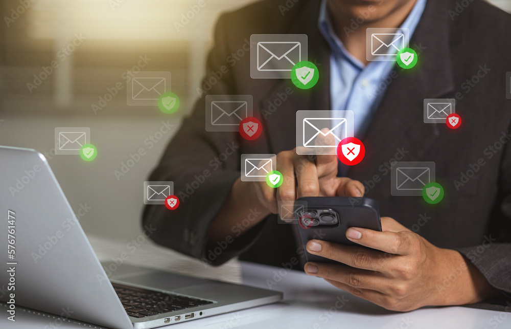 Leinwandbilder businessman using smartphone with electronic email hacking and spam warning symbol. cyber attack net