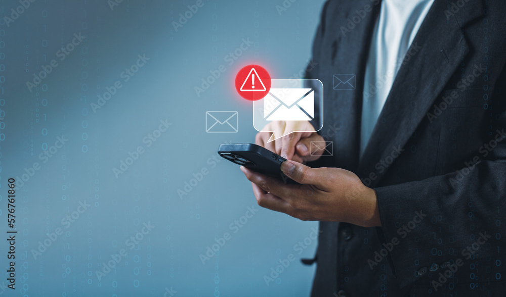 Leinwandbilder businessman using smartphone with electronic email hacking and spam warning symbol. cyber attack net