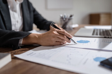 Fototapeta premium Business investor analyzing a valuation data forecast a investment project..