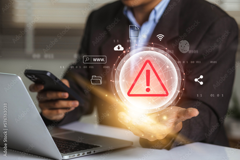 Leinwandbilder Businessman using laptop with data information privacy and internet connection hacking and spam warning symbol. cyber attack network, virus, spyware, Cyber security and cybercrime.