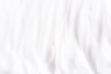 Fototapeta na wymiar White texture of cream background.