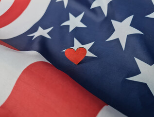 Love for America and heart on the background of USA flag