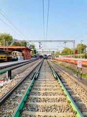 Fototapeta na wymiar Indian people crossing railway track in mumbai 