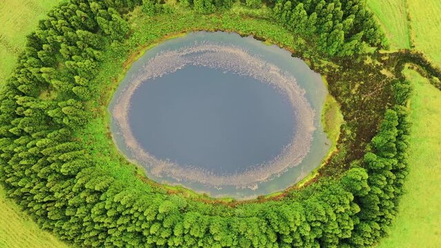 Aerial view of Lagoa Pau Pique on Terceira Island. Azores archipelagos, Portugal.