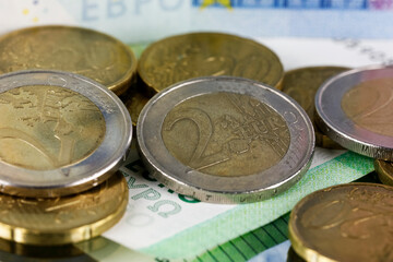 European Union coins, a note is in the background