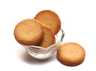 Shortbread biscuits pile in glass bowl, breton style, close up tea pastry with butter isolated on...