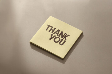 Thank you text on adhesive note paper