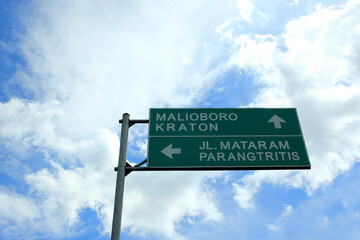 Road directions sign to Malioboro or Yogyakarta Palace