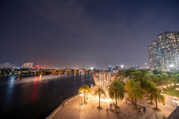 Beautiful night view with colorful sky at Landmark 81 - it is a super tall skyscraper with development buildings along Saigon river in Ho Chi Minh city, Vietnam.