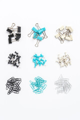 Various kinds of paper clips and drawing pins