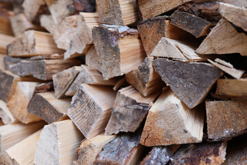 Pile of chopped wood logs for bonfire