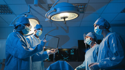 The medical team discussed the surgical options with the patient before proceeding with the...