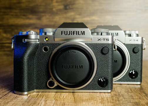 Newcastle UK: 17th Jan 2023: Fujifilm's XT caermas an X-T5 and a X-T4 solated with wood background