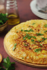 Frittata, traditional egg and potato omelette, Italian dish