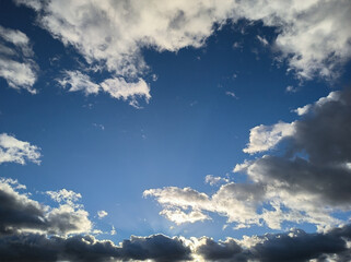 Huge hole between white and black clouds