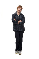 front view of a woman with sportswear witn arms crossed o white background © Curto
