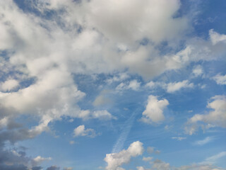 Multi-shaped and abstract clouds in the blue sky