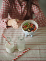 the girl has breakfast