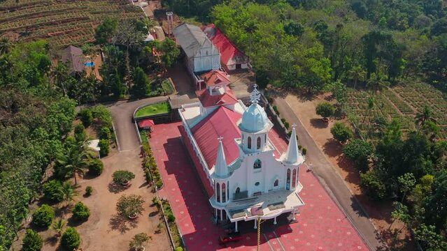 St. George church in Kerala Jungle, Ettumanoor, 4k aerial drone view