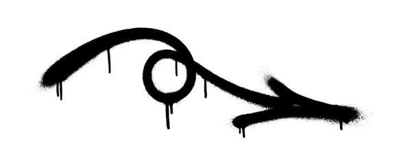 Graffiti arrow with overspray in black over white.