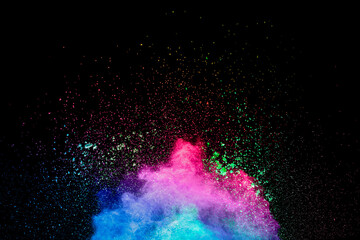 Colorful powder explosion.Bright pastel color dust particles splash.