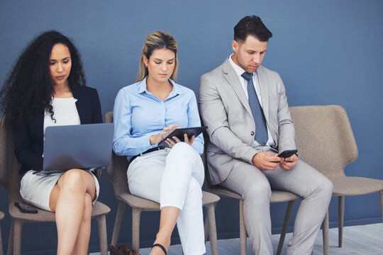 Human resources, technology and business people waiting in line for an interview during the recruitment process. Resume, diversity or hiring with a man and woman employee group sitting in an hr line
