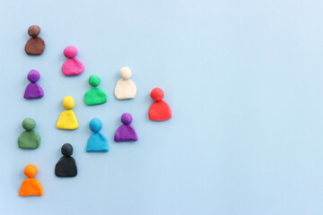 Group of colorful figures over blue background
