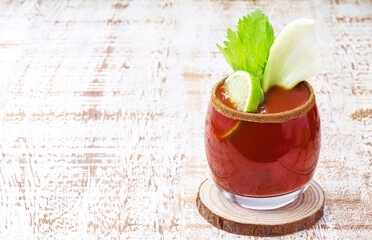 Bloody mary, a red drink based on vodka, tomato juice, lemon juice, celery, peas, Worcestershire sauce, tabasco and pepper