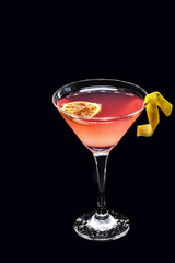 Cosmopolitan Martini, fresh in details with a touch of citrus fruit, garnished with a slice of lemon or dried orange,made with rum or gin