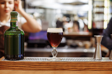 Making coffee in a coffee shop on a coffee machine