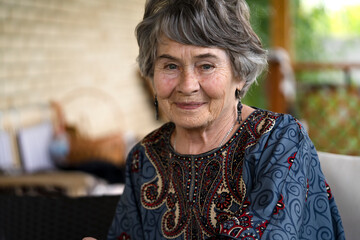 Happy old woman with smiling face closeup view.