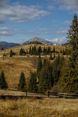 Houses high in the mountains on a sunny autumn day