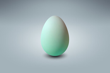 green Egg on a light blue floor
