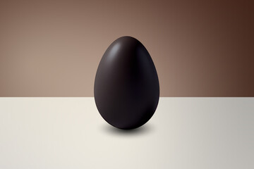 black chocolate Easter egg in front of a brown wall and on a white floor