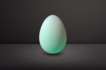 green Egg in front of a black wall and on a black floor