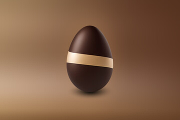 Milk and white chocolate Easter Egg on a brown floor