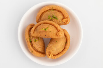 Gujia Also Called Gujiya, Pirukiya, Pirukia, Pedakiya, Karanji, Basundi Or Gughra Stuffed With Mawa, Khoya, Chasni, Mava, Khoa - Indian Sweet Dumpling Enjoyed On Deepawali, Teez, Holi, Diwali And Teej