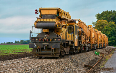 Rail layer service train in Czech countryside