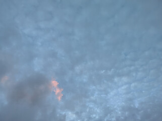 Lots of clouds in the sky with the sky being a very light