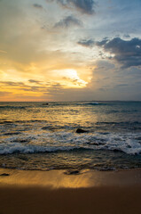 Beautiful tropical sunset on the sandy coast