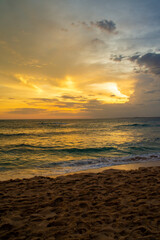 Beautiful tropical sunset on the sandy coast