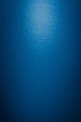 scratched blue metal sheet with visible texture. background
