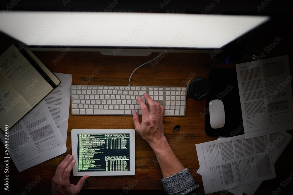 Aufkleber Binary is his second language. High angle shot of an unidentifiable computer programmer working alone late at night.