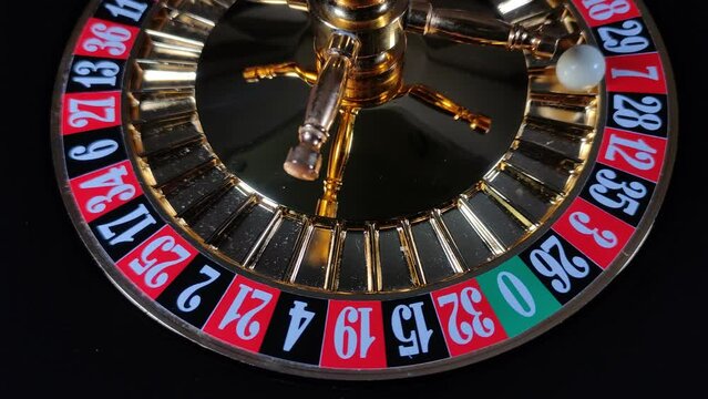 The roulette wheel in the casino is spinning - 7 red wins