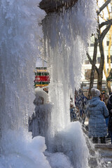 NEW YORK, NEW YORK – USA DECEMBER 25 2022: The Josephine Shaw Lowell Memorial Fountain is frozen in Bryant Park on Christmas Day due to the coldest cold wave for past 20 years at Midtown Manhattan.