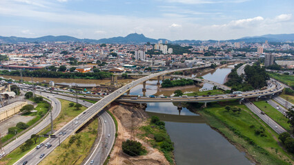 aerial view of Complexo do Cebolão is a set of bridges and viaducts in the region where the Tietê and Pinheiros rivers meet, in the city of São Paulo, Brazil. View from the bridges.
