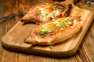 khachapuri - bread baked with cheese and egg