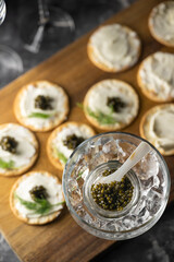 caviar on cracker with cream cheese